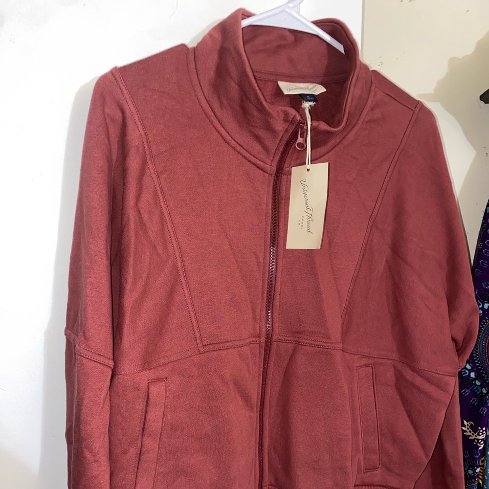A burgundy/Red Zipper Sweater